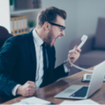 man yelling at the phone